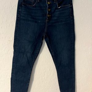 Loft skinny jeans with exposed button front.